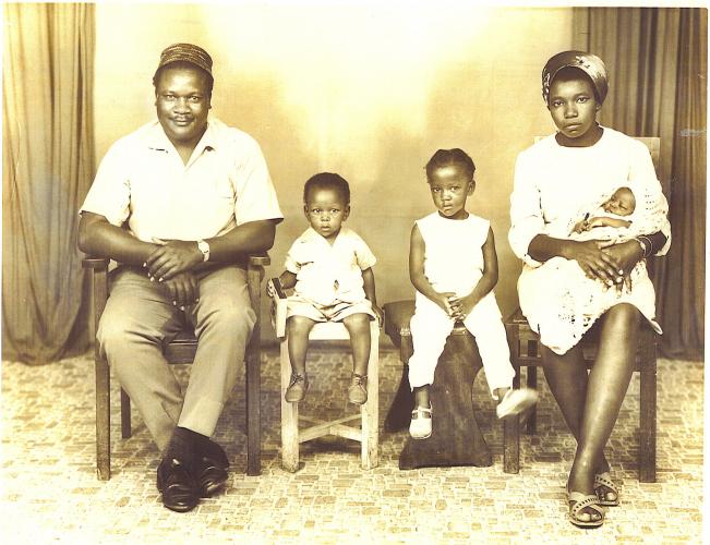 Dad, Nkuruma, Atieno and Mum holding Esther